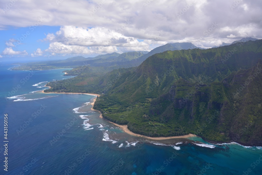 Fototapeta premium the coastline and coral reef around princeville, north kauai, hawaii, as seen from a helicopter