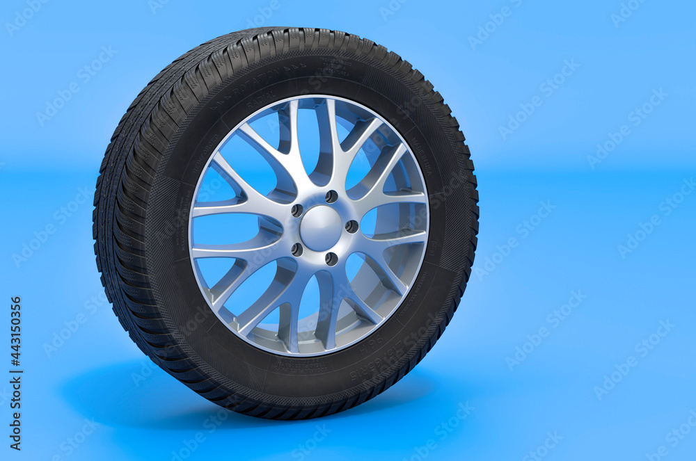 Car wheel on blue backdrop, 3D rendering Car wheel on blue backdrop, 3D rendering