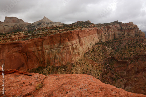 View of eroded rock formations along the  trail to Cassidy's  arch in capitol reef national park, utah photo