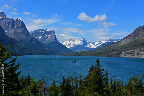 spectacular panorama of fusillade mountain and gunsight ridge from the wild goose island lookout in glacier national park, montana