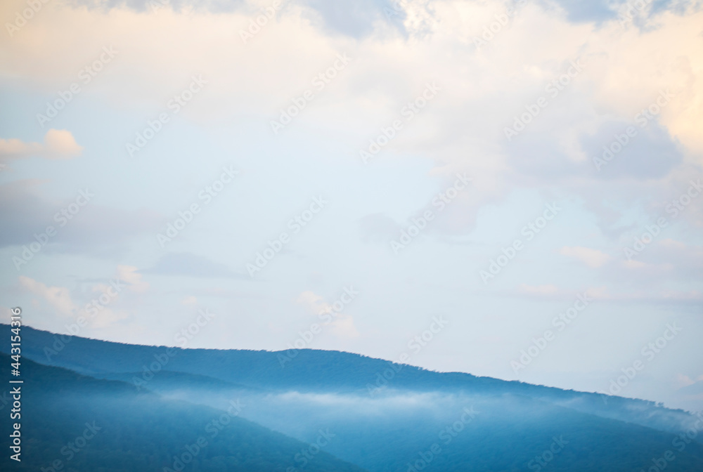 Fototapeta premium clouds over the mountains