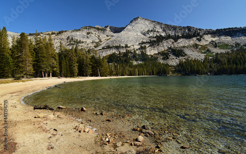 tranquil alpine tenaya lake and mountain peaks on the eastern side of yosemite national park, california