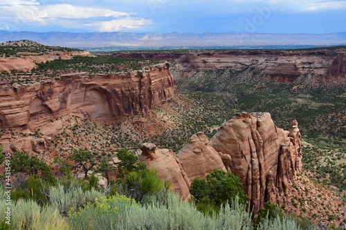 spectacular viewpoint of eroded rock formations and the book cliffs along the  rim rock road in  colorado national monument, fruita, colorado  photo