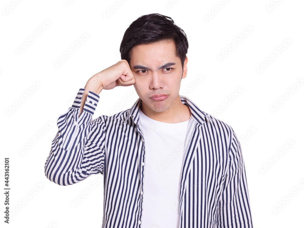 The handsome young man with anxious and annoyed expression, touched his head The handsome young man with anxious and annoyed expression, touched his head