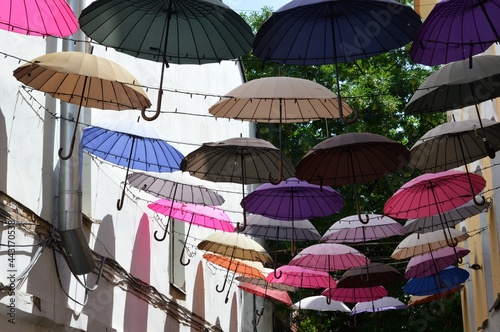 Kharkiv. Ukraine. View of city small line decorated by multicolored umbrellas.