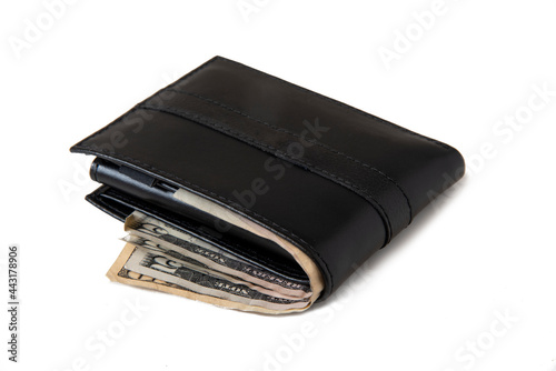Wallet with cash sticking out of it on a white background