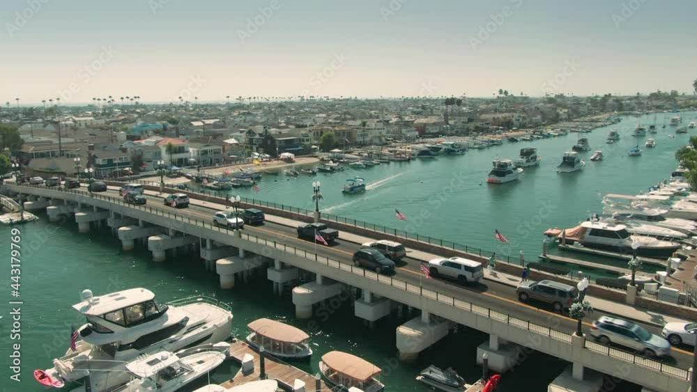 Aerial: Traffic crossing bridge onto Balboa Island, Newport Beach, California, USA Aerial: Traffic crossing bridge onto Balboa Island, Newport Beach, California, USA