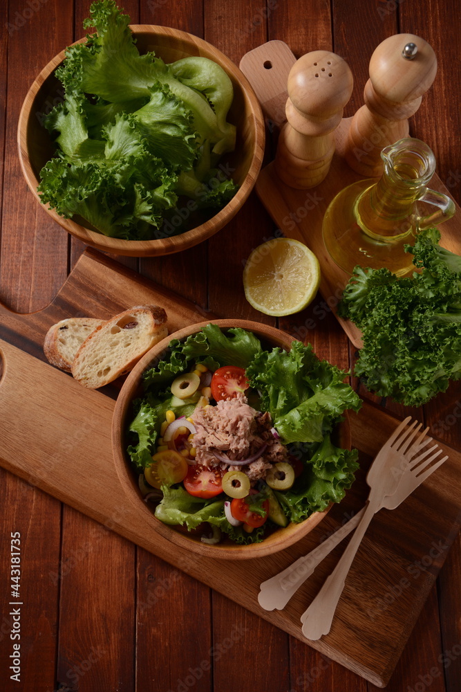 Tuna Fish Salad with Lettuce, Cherry Tomatoes, Cucumber, onions and Corn, and olives