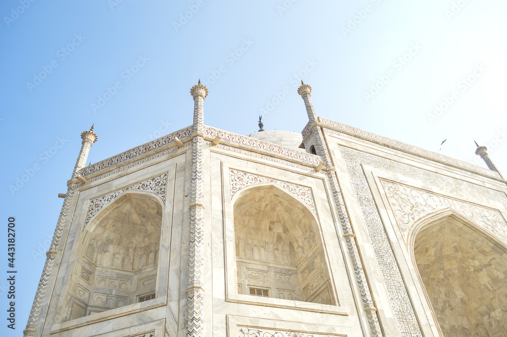 The Taj Mahal, originally the Rauza-i-munawwara is an ivory-white marble mausoleum on the southern bank of the river Yamuna in the Indian city of Agra. 