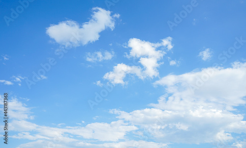 Blue sky with clouds and Sun can be use as background 