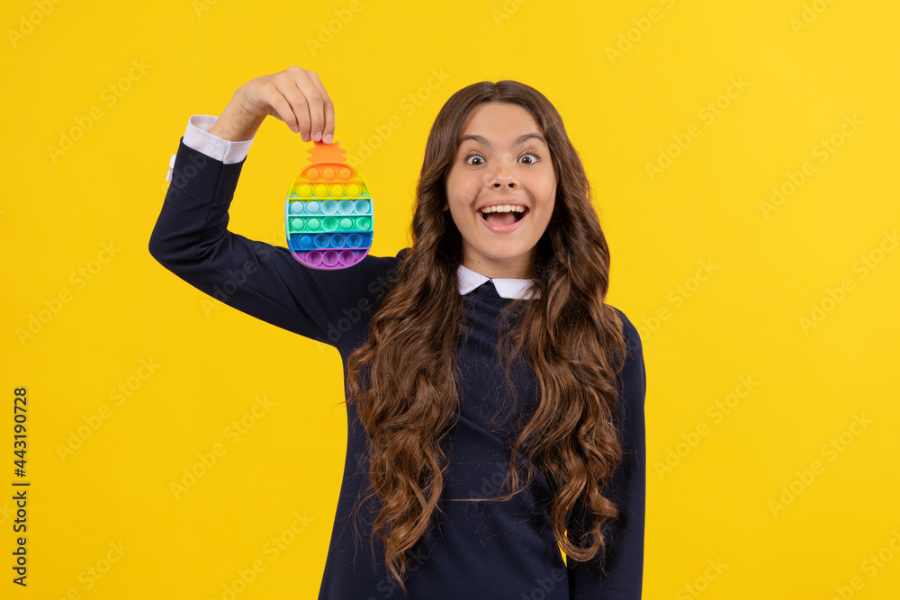 girl with finger game. kid popping anti stress bubble. childhood craze. motor skills. girl with finger game. kid popping anti stress bubble. childhood craze. motor skills.