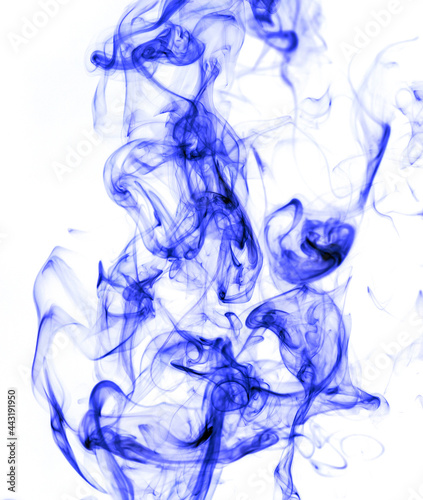 Blue smoke on a white background. © schankz