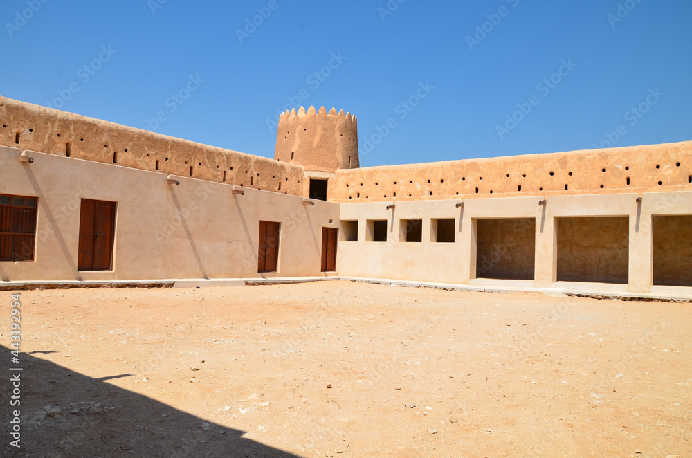 Historical Al Zubarah fort in Qatar with an cannon in front