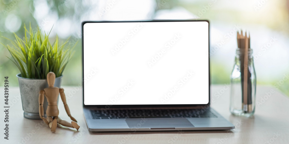 Mock up blank screen tablet in modern office room with stationery and office supplies on white table Mock up blank screen tablet in modern office room with stationery and office supplies on white table