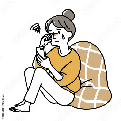 スマホで目が疲れてしまった女性