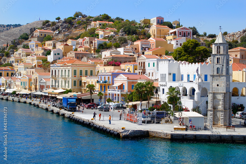 Greece. Dodecanese. Islands Symi.Colorful houses and boats .