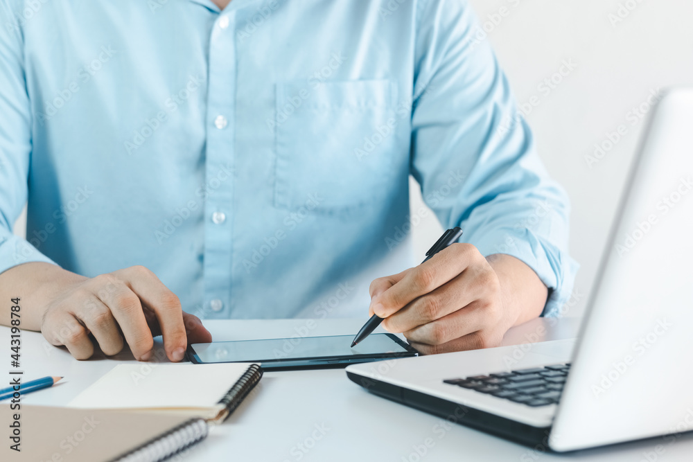 the Youngman hands drawing on a digital tablet on a digital tablet with an electronic pen. Freelance professional designer working from a distance. the Youngman hands drawing on a digital tablet on a digital tablet with an electronic pen. Freelance professional designer working from a distance.
