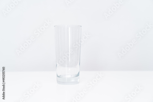 empty glass on a white background. ordinary dishes for every day.