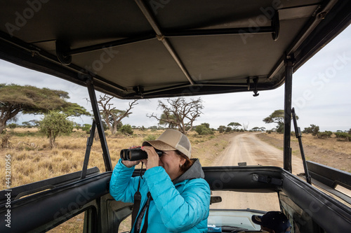 woman tourist posing during safari in africa