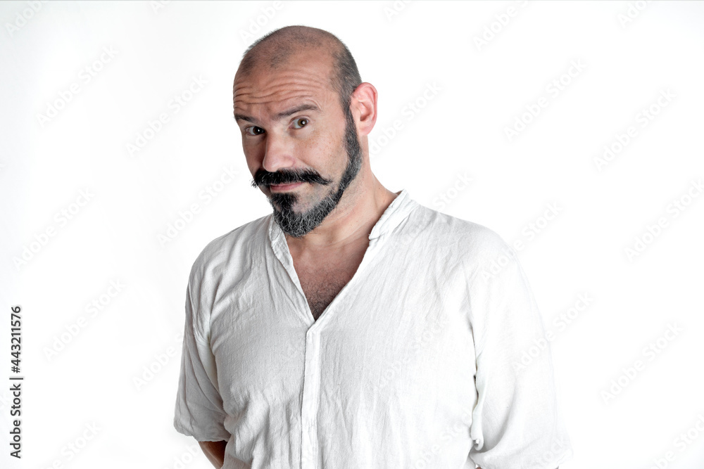 portrait of caucasian person on white background with mustache and beard looking at camera with doubtful expression. portrait of caucasian person on white background with mustache and beard looking at camera with doubtful expression.