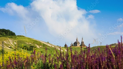View of New Jerusalem, a wooden church complex on Mikheevskaya Gora in the village of Sukharevo, 30 km from the city of Valuyki. Belgorod region, Russia. Beautiful movement of clouds, Time lapse.