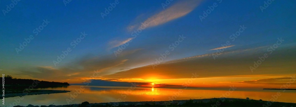 Fototapeta premium sunset over the river