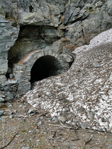 One of the 14 galleries on the trekking path between Brusson and Col De Joux in Val D'Ayas, Aosta, Italy. Here a snow slide obstructed the way in early june photo