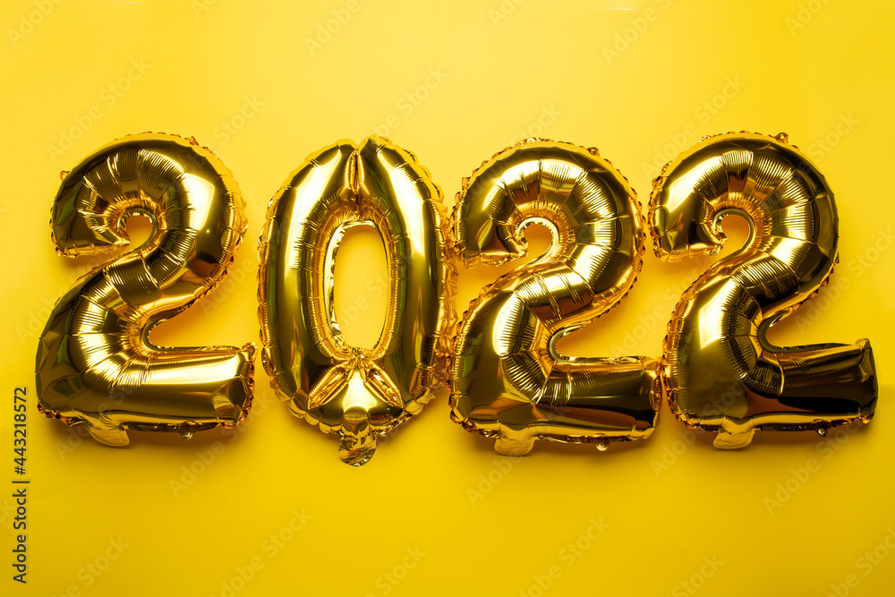 Gold foil numbers 2022 festive balloon concept new year Gold foil numbers 2022 festive balloon concept new year