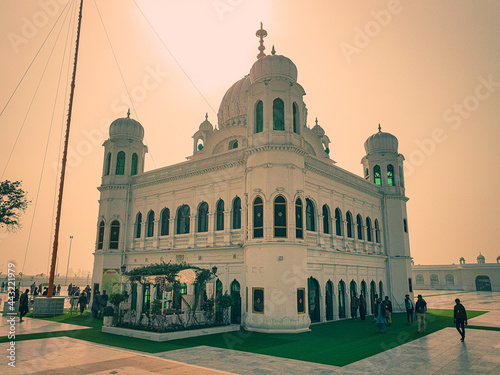 Gurdwara Sri Darbar Sahib, Kartarpur - February, 14, 2021: Narowal, Pakistan, Opened on 09 Nov 2019, also claimed to be the largest Gurdwara in the world and second holiest site of Sikh Religion. photo