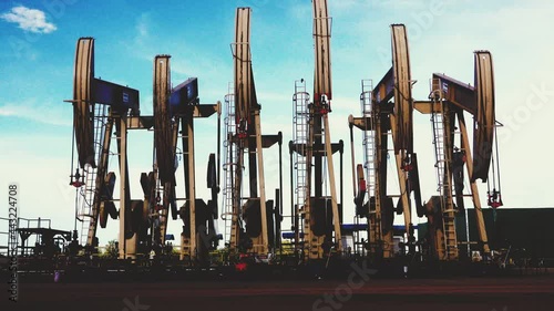 Oil extracting by pump jack in the oil field
