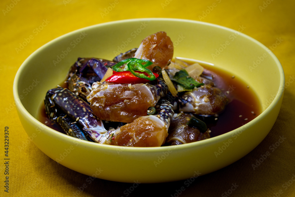 Korean food Raw crabs marinated in soy sauce which is called Ganjang-gejang Korean food Raw crabs marinated in soy sauce which is called Ganjang-gejang