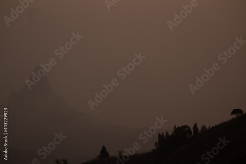 View of rangaswamy peek in kodanadu in the early morning and clouds passing top of the peek