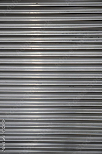 Background from unpainted corrugated metal. Horizontal stripes.