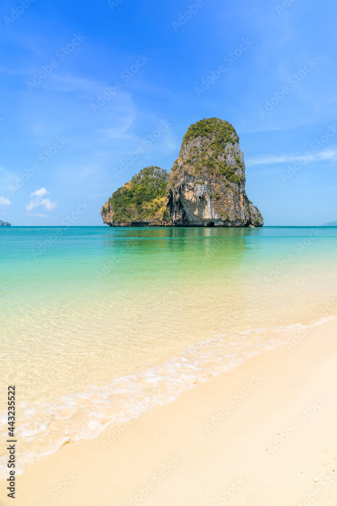 Ao Phra Nang near Railay beach with crystal clear water and exotic limestone island cliff, Krabi, Thailand Ao Phra Nang near Railay beach with crystal clear water and exotic limestone island cliff, Krabi, Thailand