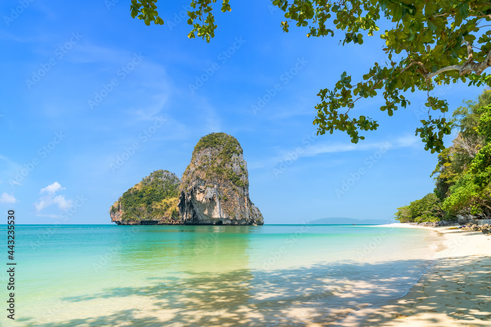 Ao Phra Nang near Railay beach with crystal clear water and exotic limestone island cliff, Krabi, Thailand