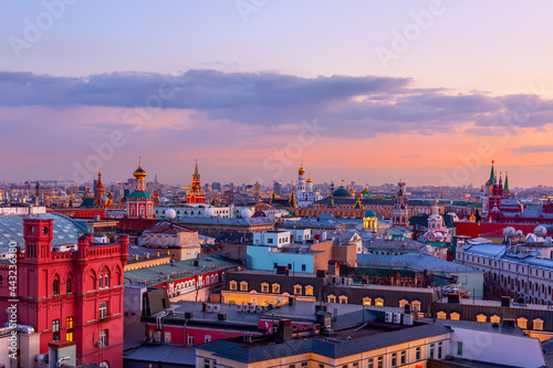 Aerial sunset view of the center of Moscow with Kremlin tower and other buildings. World famous Moscow landmarks for tourism and travel.