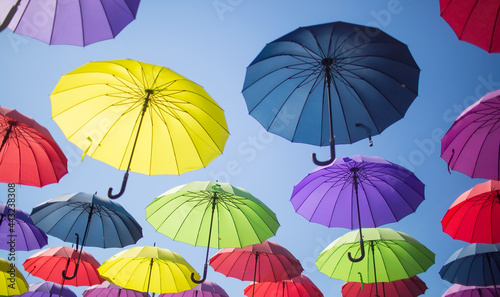 Colorful umbrellas against the sky.