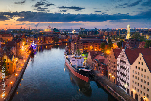 Amazing architecture of the main city in Gdansk at sunset, Poland. Aerial view of Granaries Island at the Motlawa river
