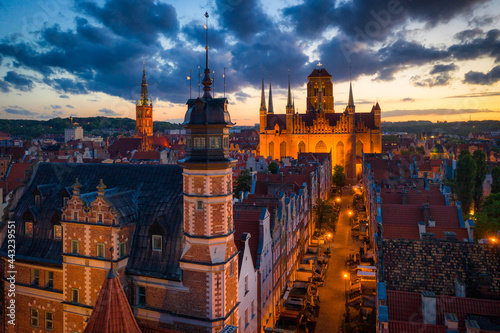 Amazing architecture of the main city in Gdansk at sunset  Poland. Aerial view of the Long Market  Main Town Hall and St. Mary Basilica
