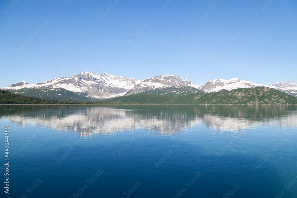 reflection of mountains in ocean reflection of mountains in ocean