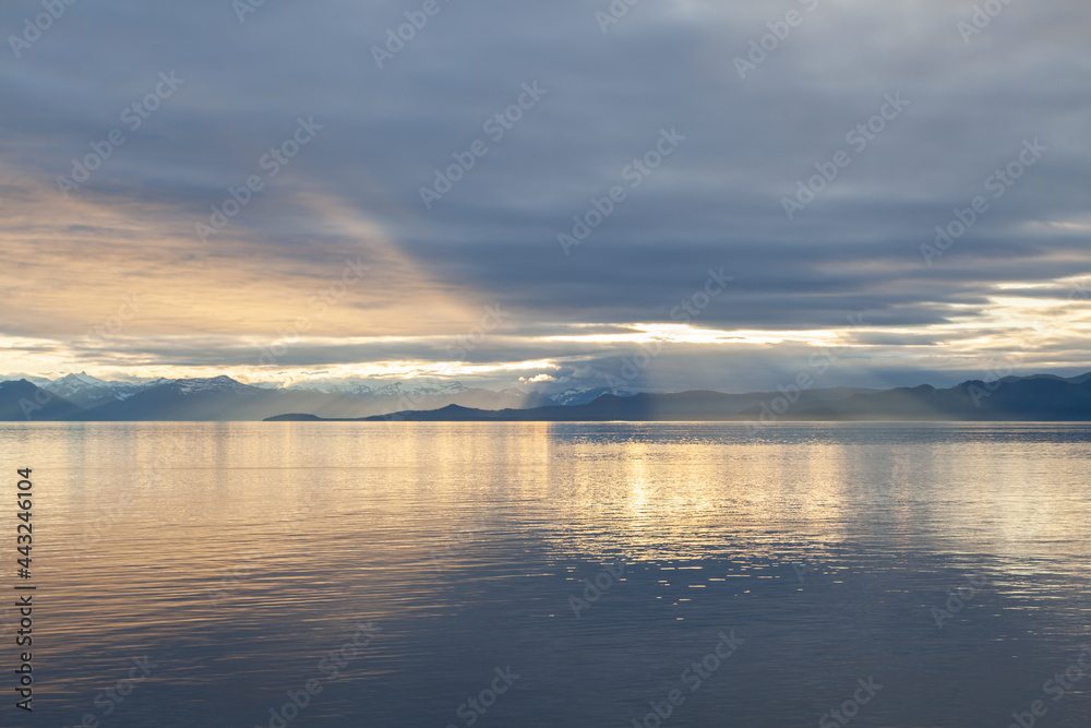 Sunset on mountains and sea in South East Alaska