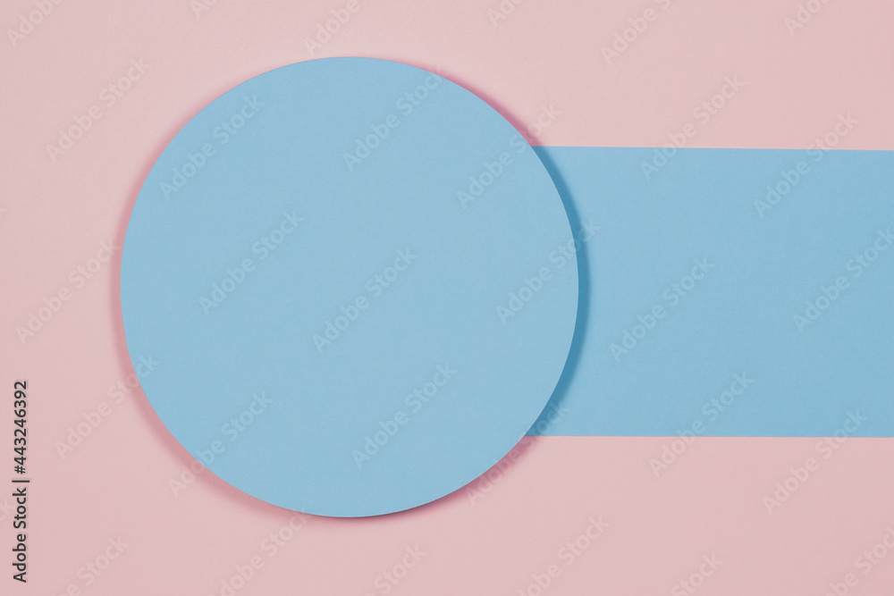 Abstract geometric texture background of pastel pink, light blue color paper. Minimal azure circle and blank line. Top view, copy space