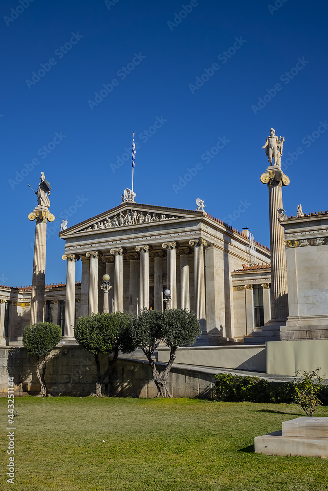 Academy of Athens complex - major landmarks of Athens. Neoclassical Academy building with statues of Greek philosophers and gods designed as part of architectural 