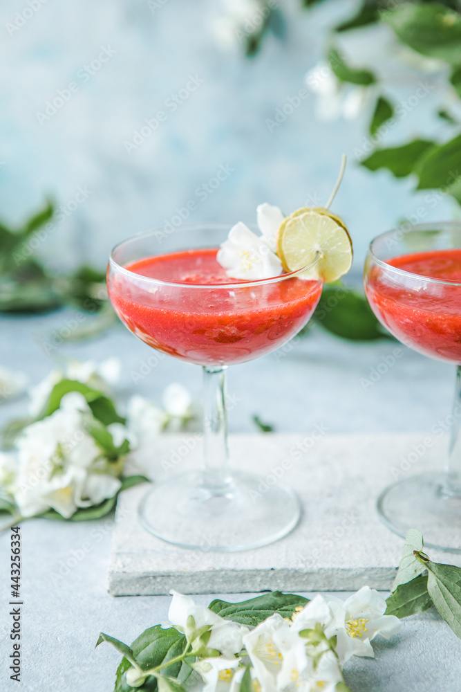 Strawberry daiquiri with a lime slice Strawberry daiquiri with a lime slice