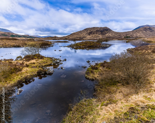 A view along a stream feeding Loch Ba near Glencoe, Scotland on a summers day