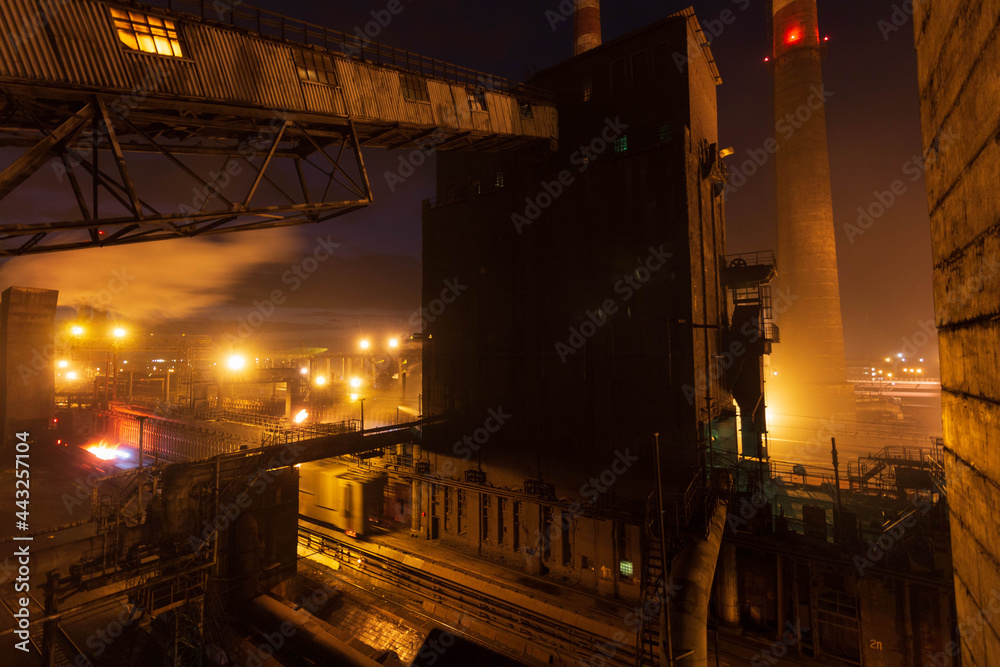 factory worker lights at night
