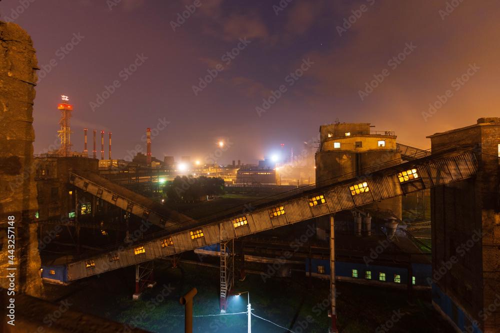 factory worker lights at night