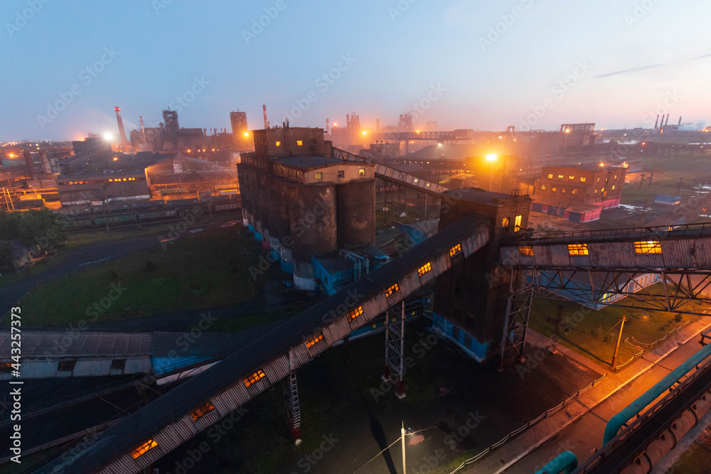 Fototapeta premium factory worker lights at night