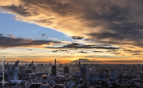 Bangkok, thailand - Jul 02, 2021 : Aerial view of Beautiful sunset over large metropol city in Asia. With tall building and skyscraper in background. Selective focus.