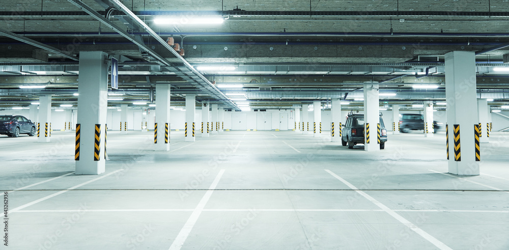 Horizontal image of clean white underground parking lot Horizontal image of clean white underground parking lot